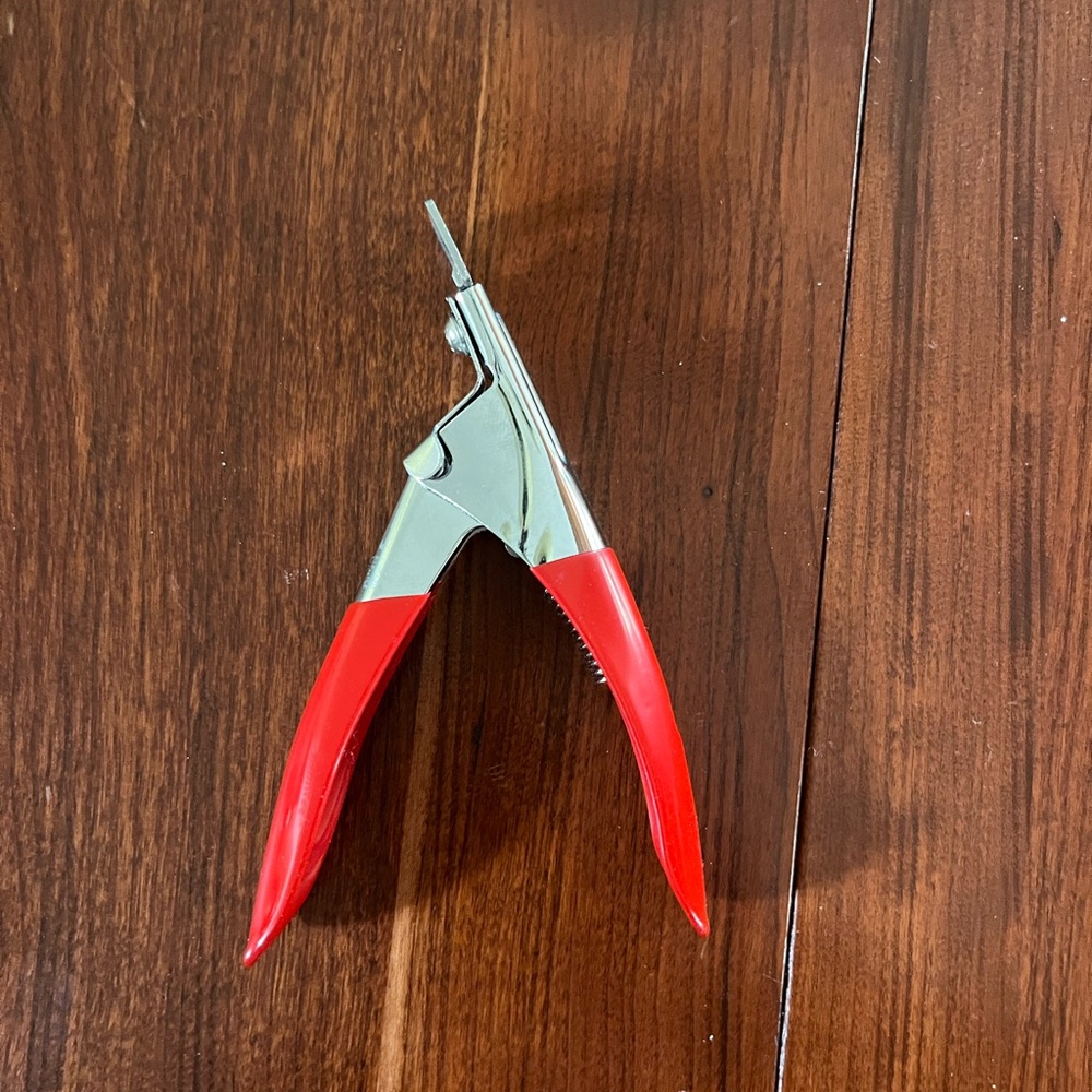 Red Nail Clipper with Silver Accents